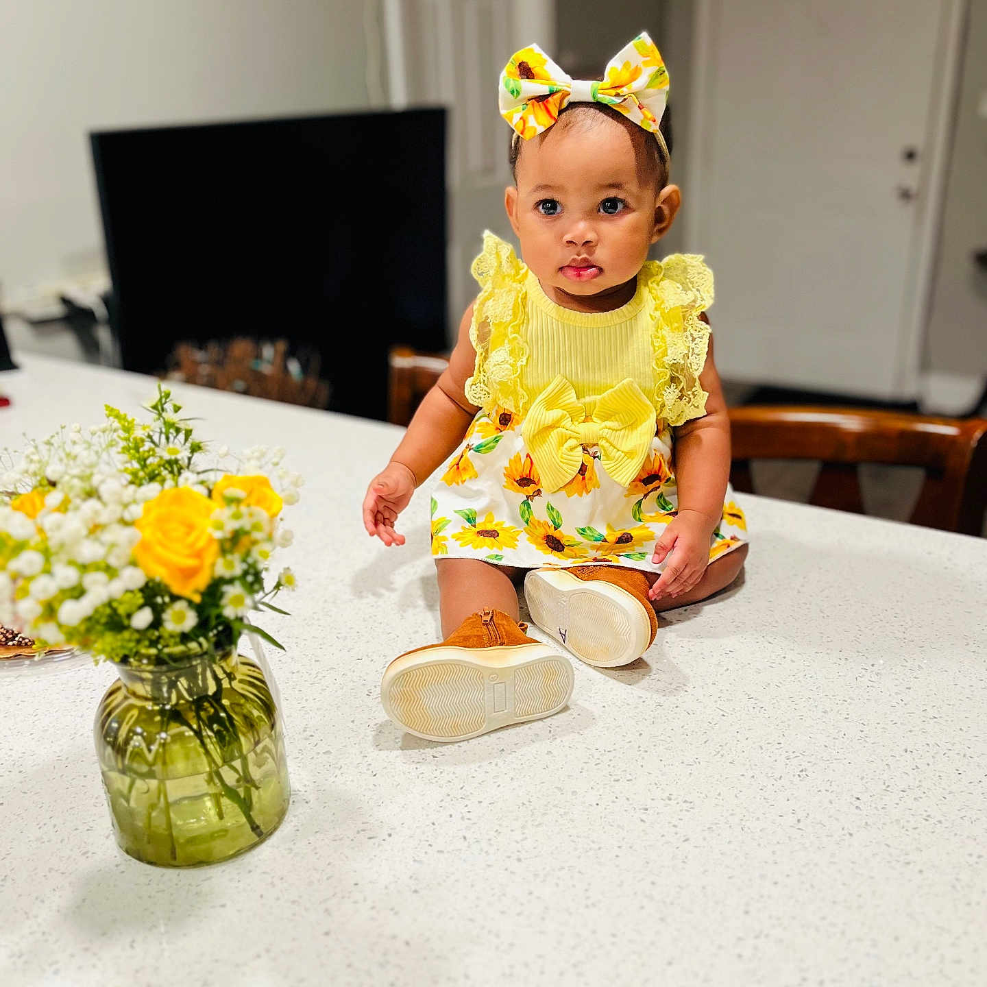 Nairah is registered to the contest to win money with this photo: baby, clothing, face, flower, flowerarrangement, flowerbouquet, hardwood, hat, head, ikebana, indoors, interiordesign, jar, person, photography, plant, portrait, pottedplant, pottery, wood