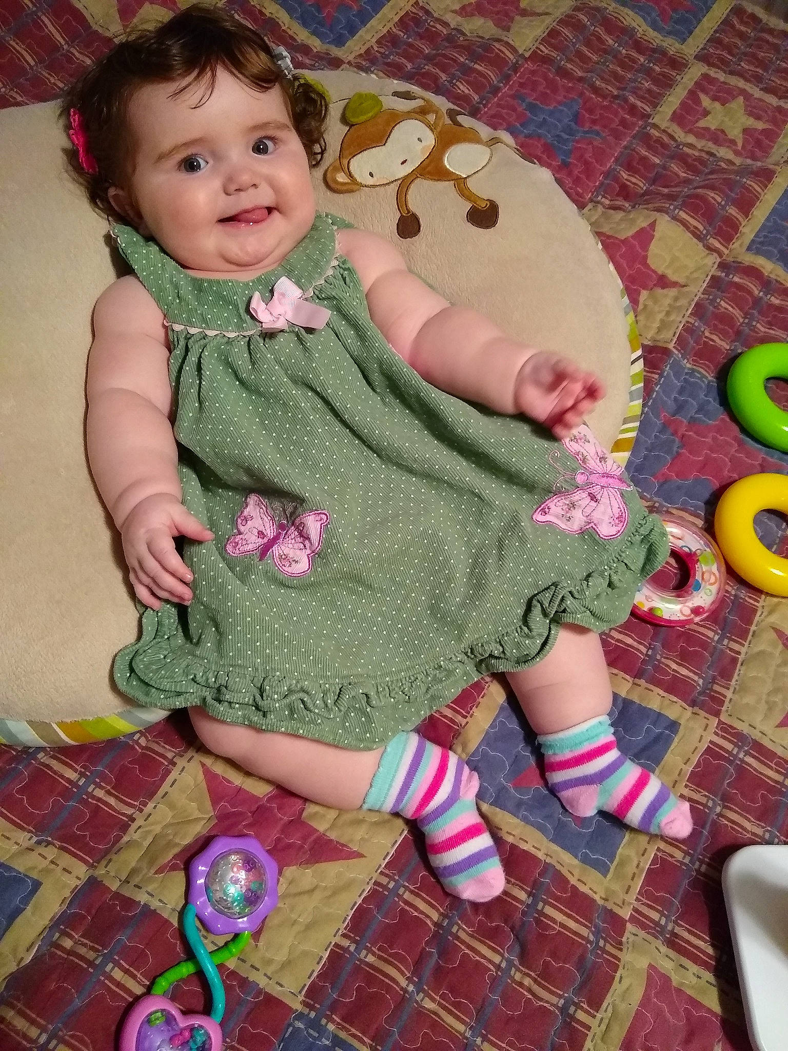 Azaria joined the competition — help win amazing prizes! baby, baby_toddler_clothing, cheek, child, doll, dress, eye, flooring, green, joy, linens, magenta, pattern, person, pink, purple, skin, sleeve, smile, textile