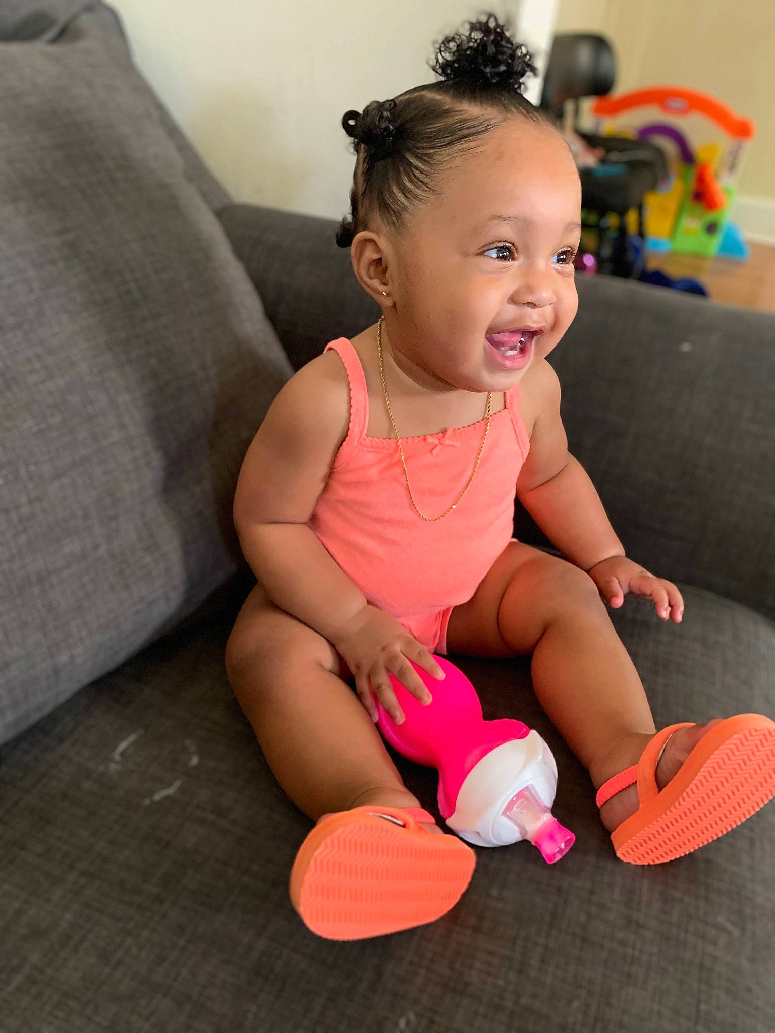 Kamia joined the competition — help win amazing prizes! arm, baby, child, child_model, finger, flooring, footwear, fun, joint, leg, neck, person, pigtail, pink, play, shoe, sitting, skin, smile, toddler
