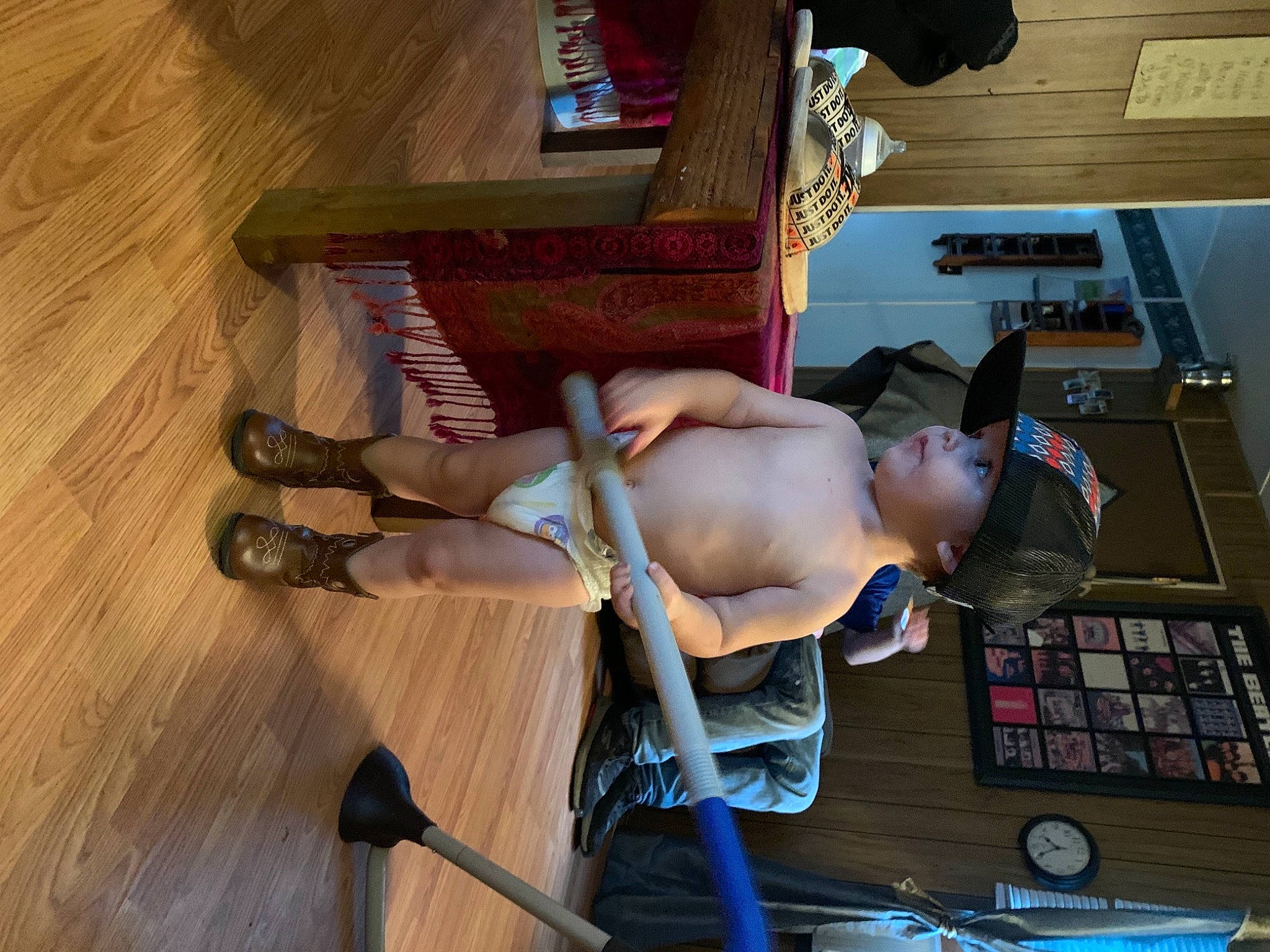 Gary joined the competition — help win amazing prizes! chest, child, elbow, finger, flooring, foot, fun, hardwood, headwear, human_leg, input_device, joint, knee, person, room, shorts, sitting, thigh, toddler, trunk