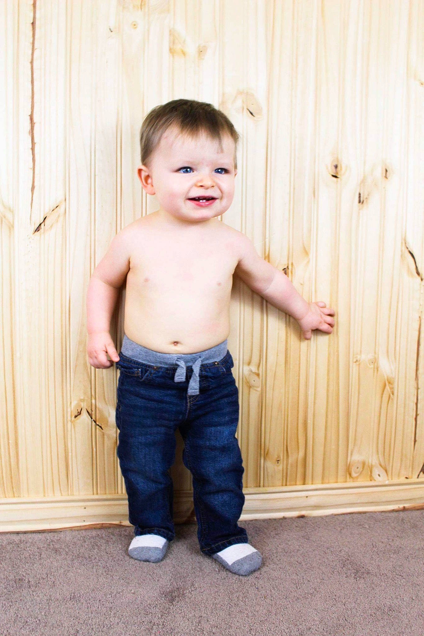 Wade is registered to the contest to win money with this photo: abdomen, baby, child, child_model, jeans, joy, male, muscle, person, sitting, skin, smile, standing, t_shirt, toddler, trunk