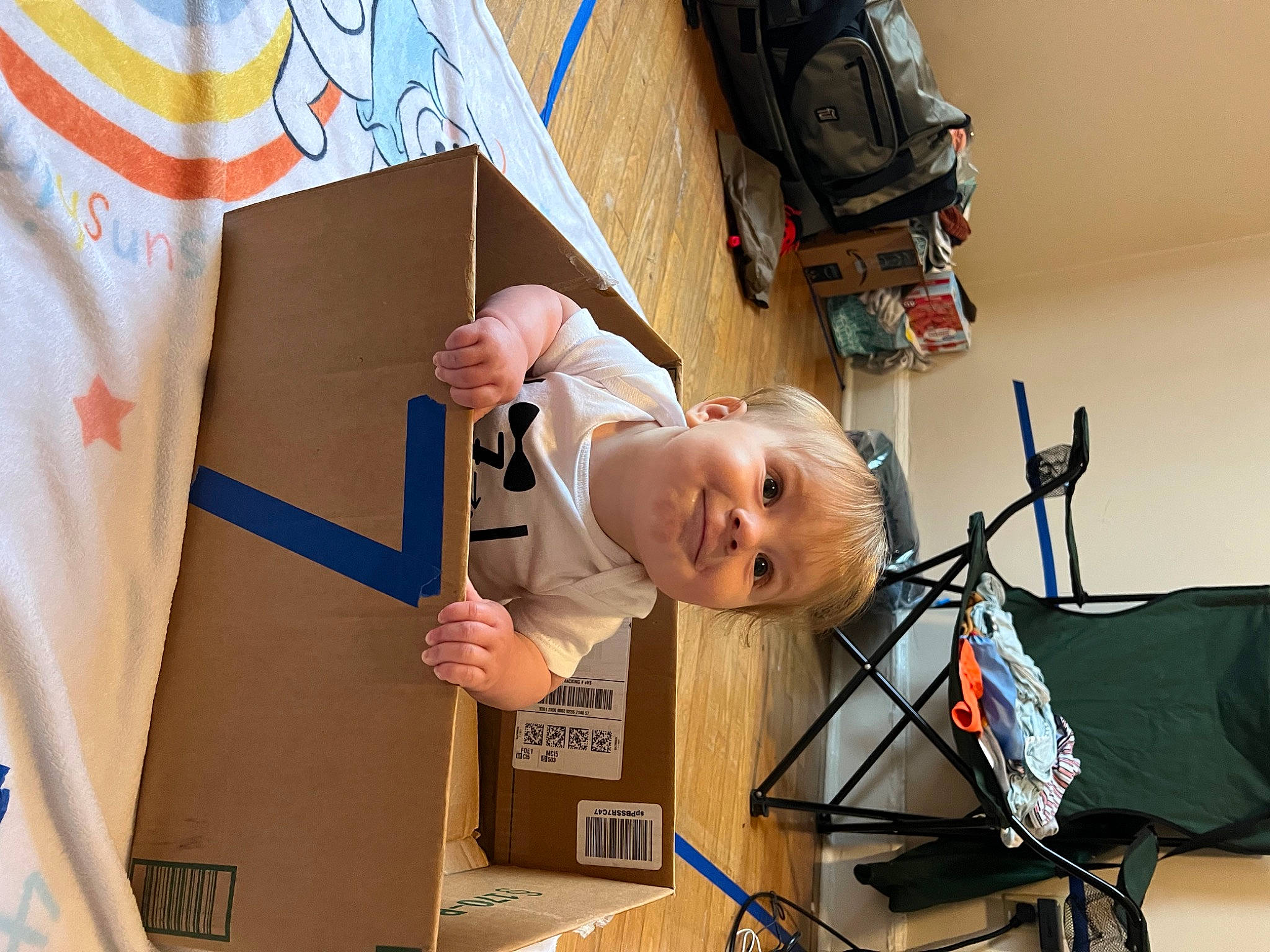 Judah joined the competition — help win amazing prizes! art, baby, baby_products, cardboard, child, fun, house, person, room, shipping_box, smile, t_shirt, toddler, visual_arts, wood