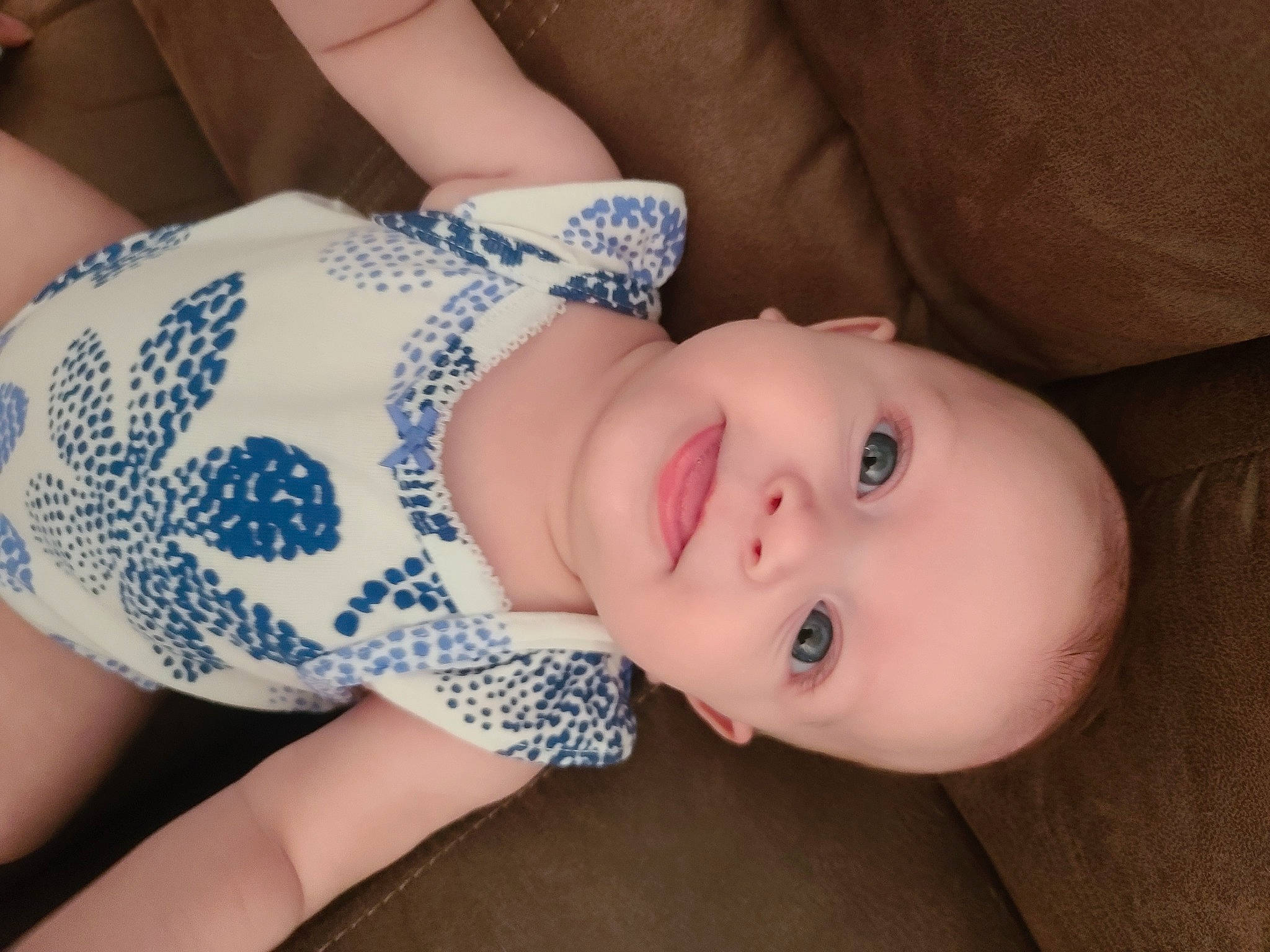 Oakleigh is registered to the contest to win money with this photo: arm, baby, baby_toddler_clothing, cheek, child, eye, eyelash, human_leg, iris, lip, mouth, nail, nose, pattern, person, product, skin, sleeve, smile, toddler