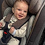 baby, baby_girl_or_boy, car_interior, car_seat, child, closeup, clothing, cute, happy, head_support, infant, infant_clothing, mickey_mouse, person, portrait, safety_harness, seat_belt, seat_cushion, smiling, young_child