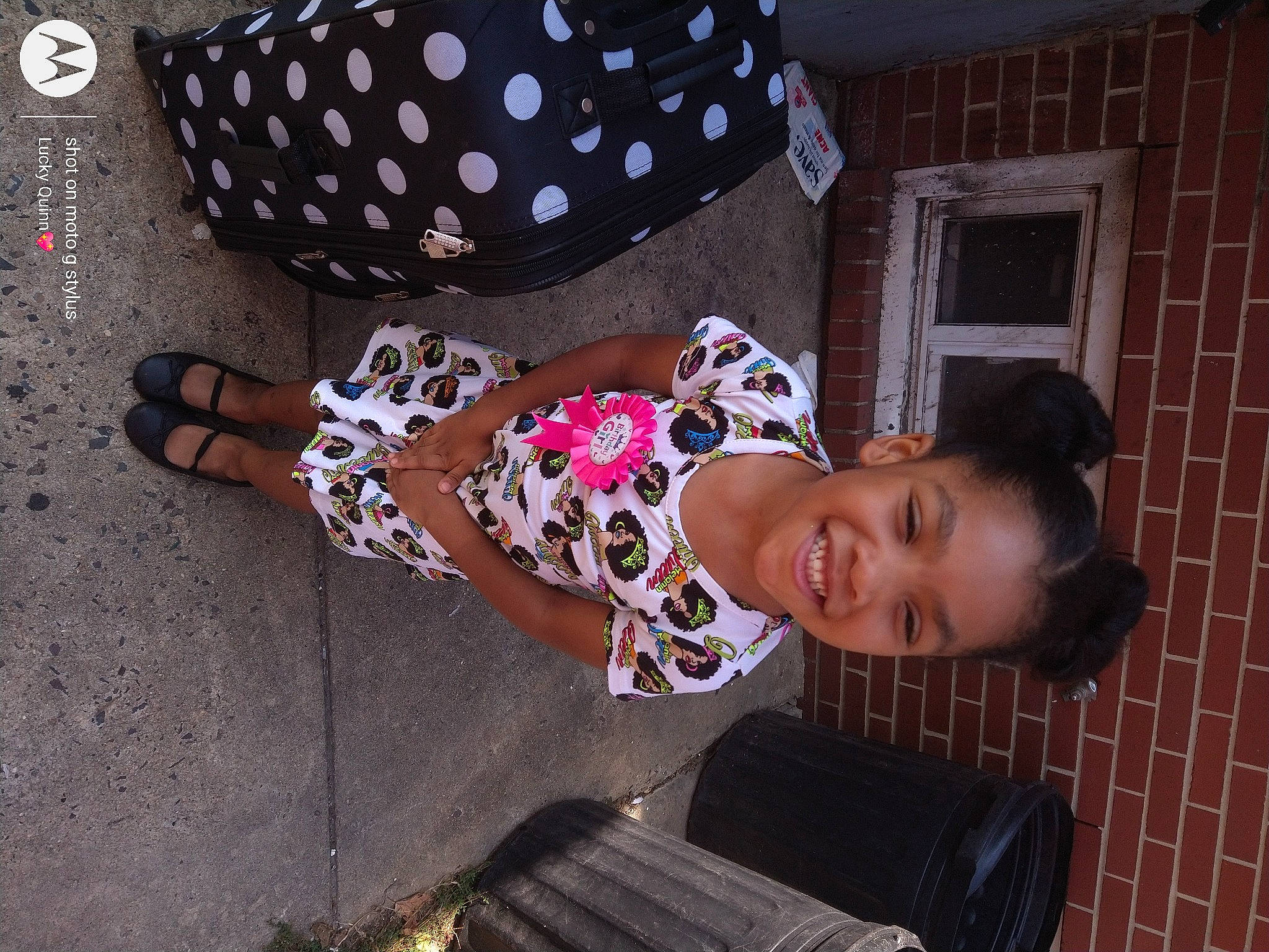 Nyalise is registered to the contest to win money with this photo: baby, baby_toddler_clothing, bag, beauty, child, cool, costume_hat, curtain, dress, fashion_accessory, fun, hat, headgear, joy, pattern, person, pink, smile, street_fashion, toddler