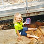 Riley joined the competition — help win amazing prizes! child, kid, barefoot, smiling, container, water, bridge, concrete, outdoor, nature, leaves, rock, blonde_hair, green_shirt, shorts, sitting, playful, puddle, metal_railing, sunny