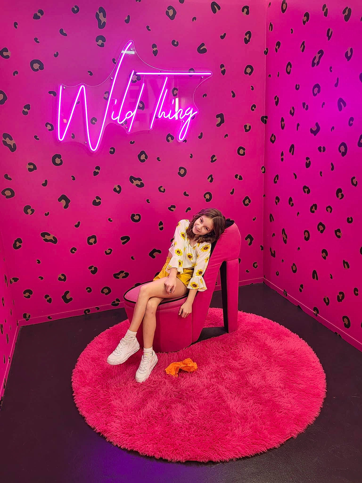 Malaya is registered to the contest to win money with this photo: art, entertainment, event, flooring, font, graphic_design, graphics, human_leg, joy, magenta, pattern, peach, person, pink, purple, rectangle, red, room, textile, thigh