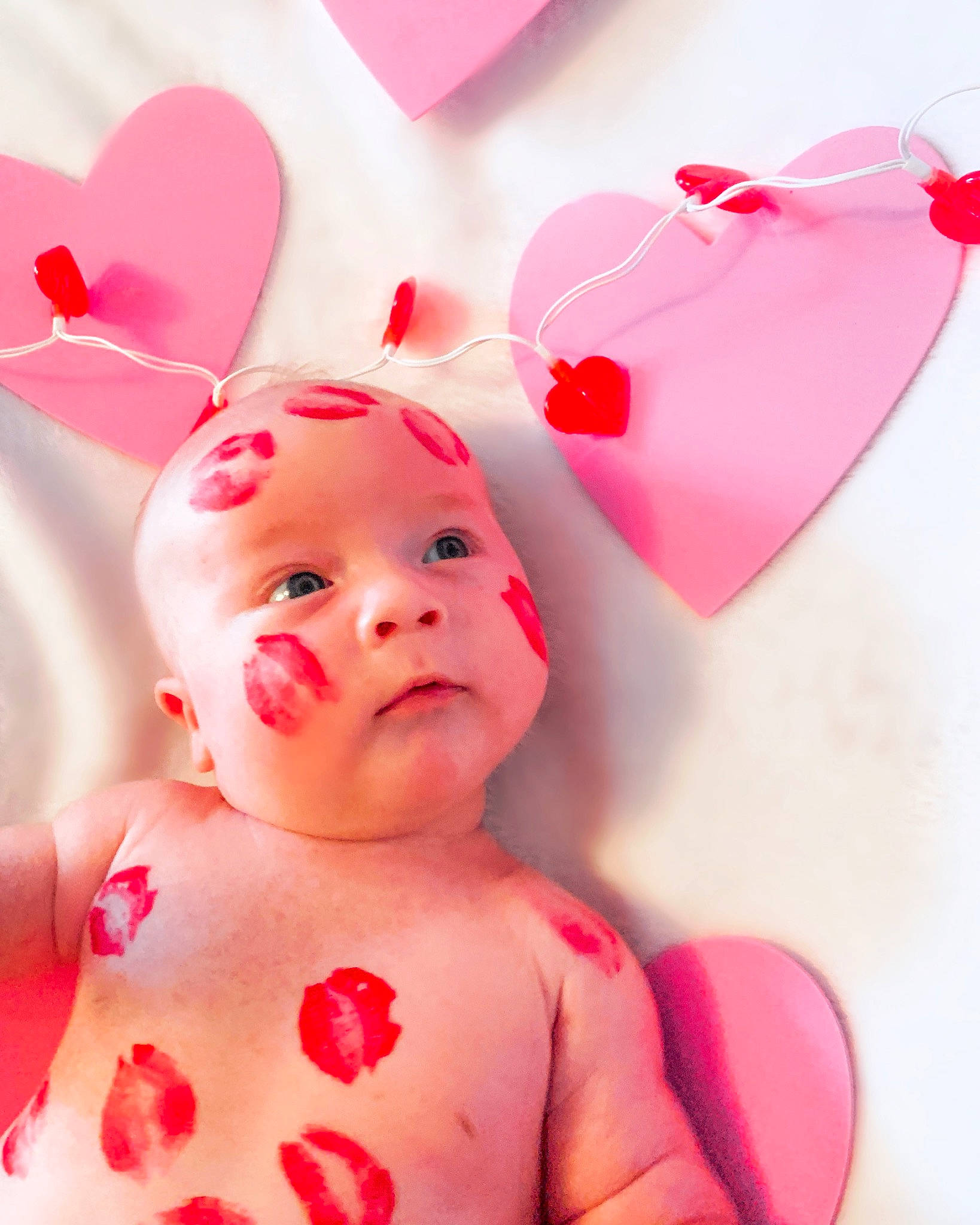 Tripp joined the competition — help win amazing prizes! baby, baby_toddler_clothing, carmine, child, dress, ear, facial_expression, fashion_accessory, hair_accessory, happy, headband, headpiece, magenta, party_supply, peach, person, petal, pink, red, textile