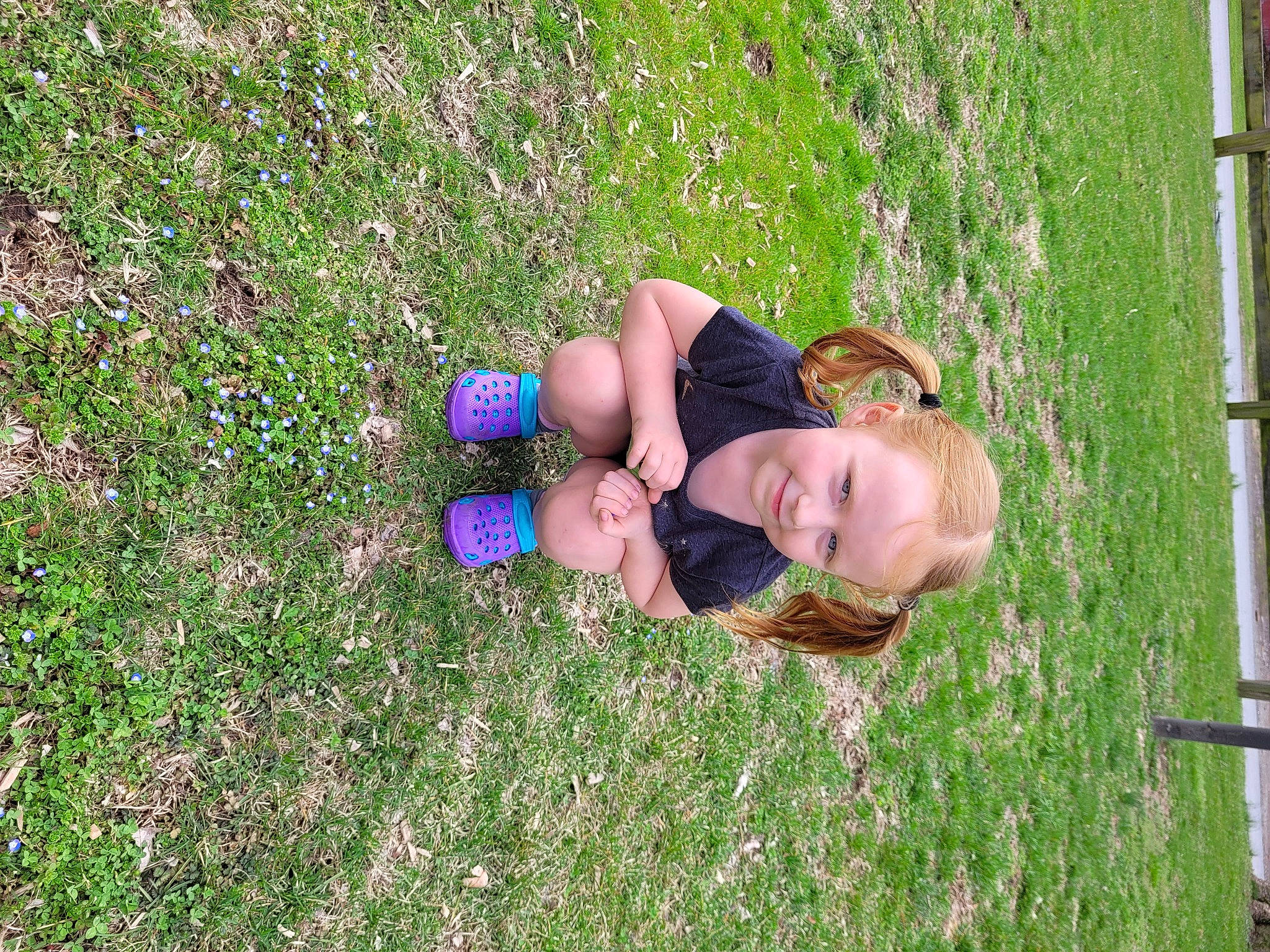 Genevieve is registered to the contest to win money with this photo: botany, electric_blue, face, field, fun, grass, grass_family, grassland, green, groundcover, happy, joy, landscape, lawn, meadow, natural_environment, nature, people_in_nature, person, plant