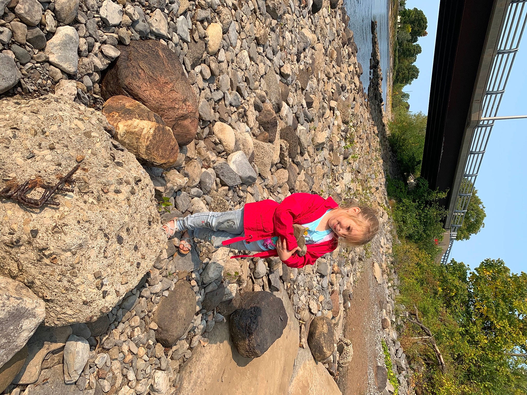 Emma is registered to the contest to win money with this photo: adventure, climbing, fun, geological_phenomenon, joy, leisure, mountaineering, person, recreation, rock, vacation