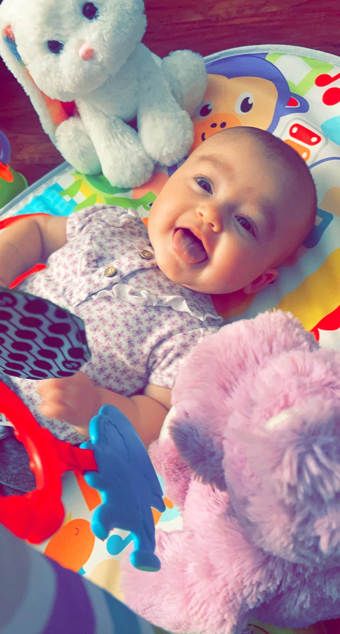 Julia joined the competition — help win amazing prizes! baby, baby_toddler_clothing, blue, cheek, facial_expression, finger, happy, human, mouth, nose, organ, person, photograph, pink, product, skin, smile, textile, toddler, toy