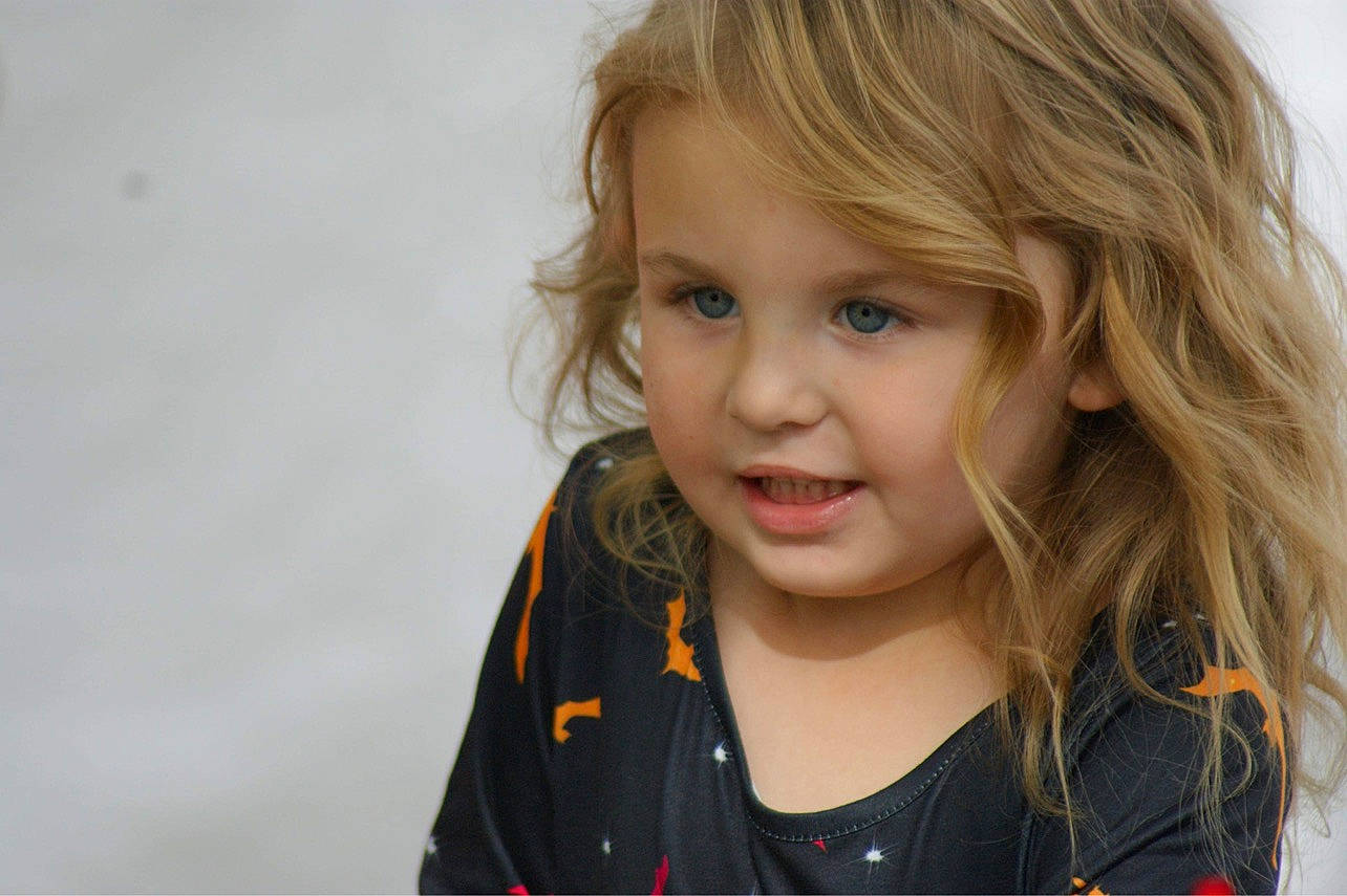 Ava joined the competition — help win amazing prizes! blond, cheek, child, eye, eyebrow, eyelash, face, fun, grass, happy, iris, layered_hair, lip, long_hair, nose, person, skin, smile, surfer_hair, t_shirt