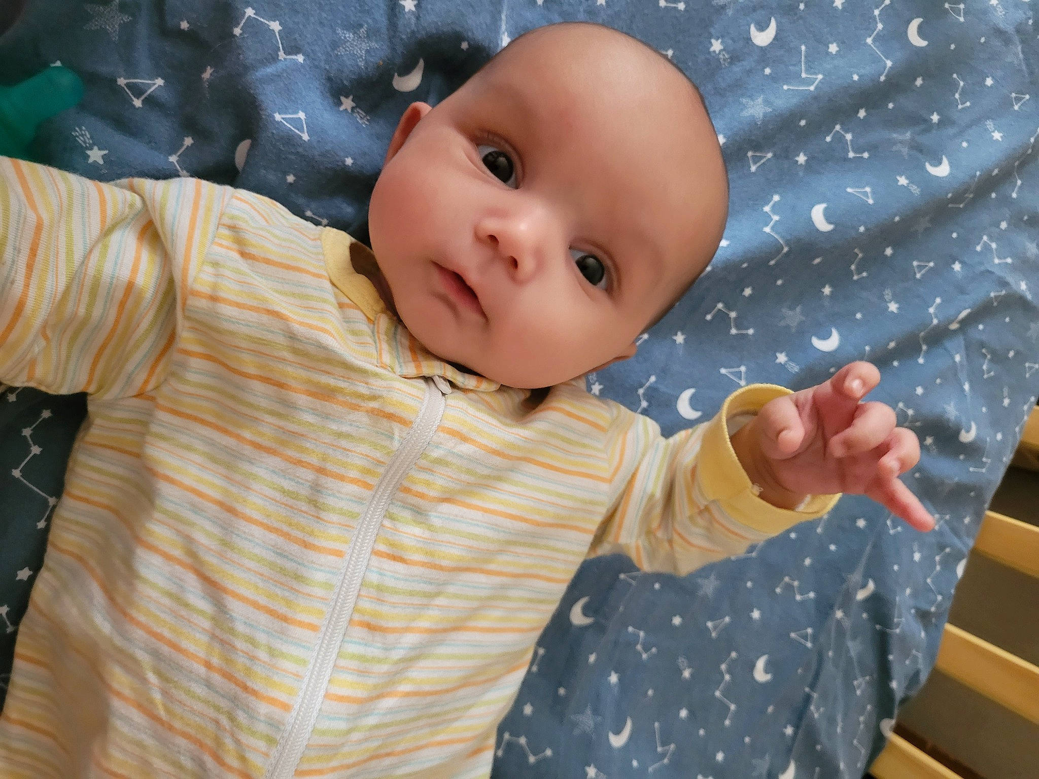 Darius is registered to the contest to win money with this photo: baby, baby_products, baby_safety, baby_sleeping, baby_toddler_clothing, cheek, child, comfort, finger, fun, gesture, happy, iris, linens, pattern, person, room, sleeve, thumb, toddler