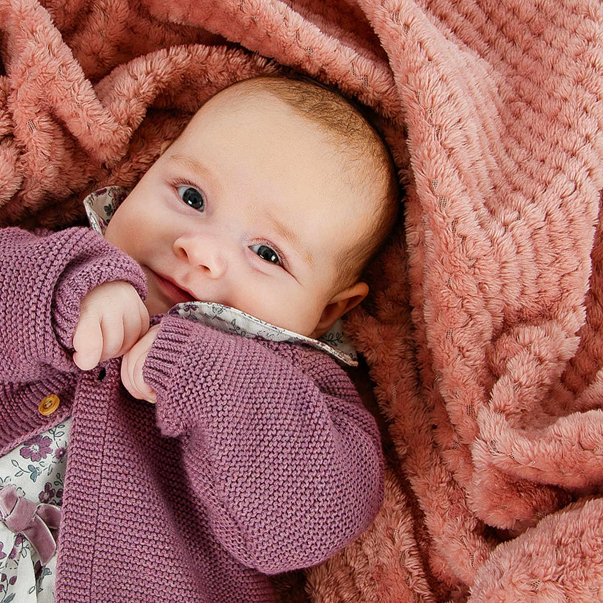 Willow is registered to the contest to win money with this photo: baby, blanket, bodypart, clothing, face, finger, hand, happy, head, knitwear, newborn, person, photography, portrait, quilt, smile, sweater, sweatshirt, wool