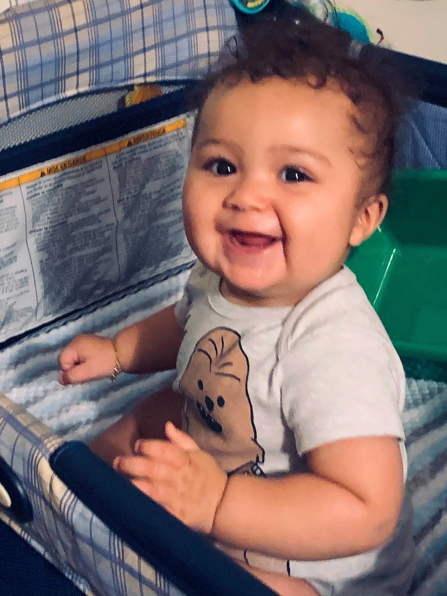 Emmanuel is registered to the contest to win money with this photo: arm, baby_toddler_clothing, cheek, cloud, comfort, eyebrow, finger, happy, human_body, iris, joy, leisure, mouth, nose, organ, person, skin, sleeve, smile, t_shirt