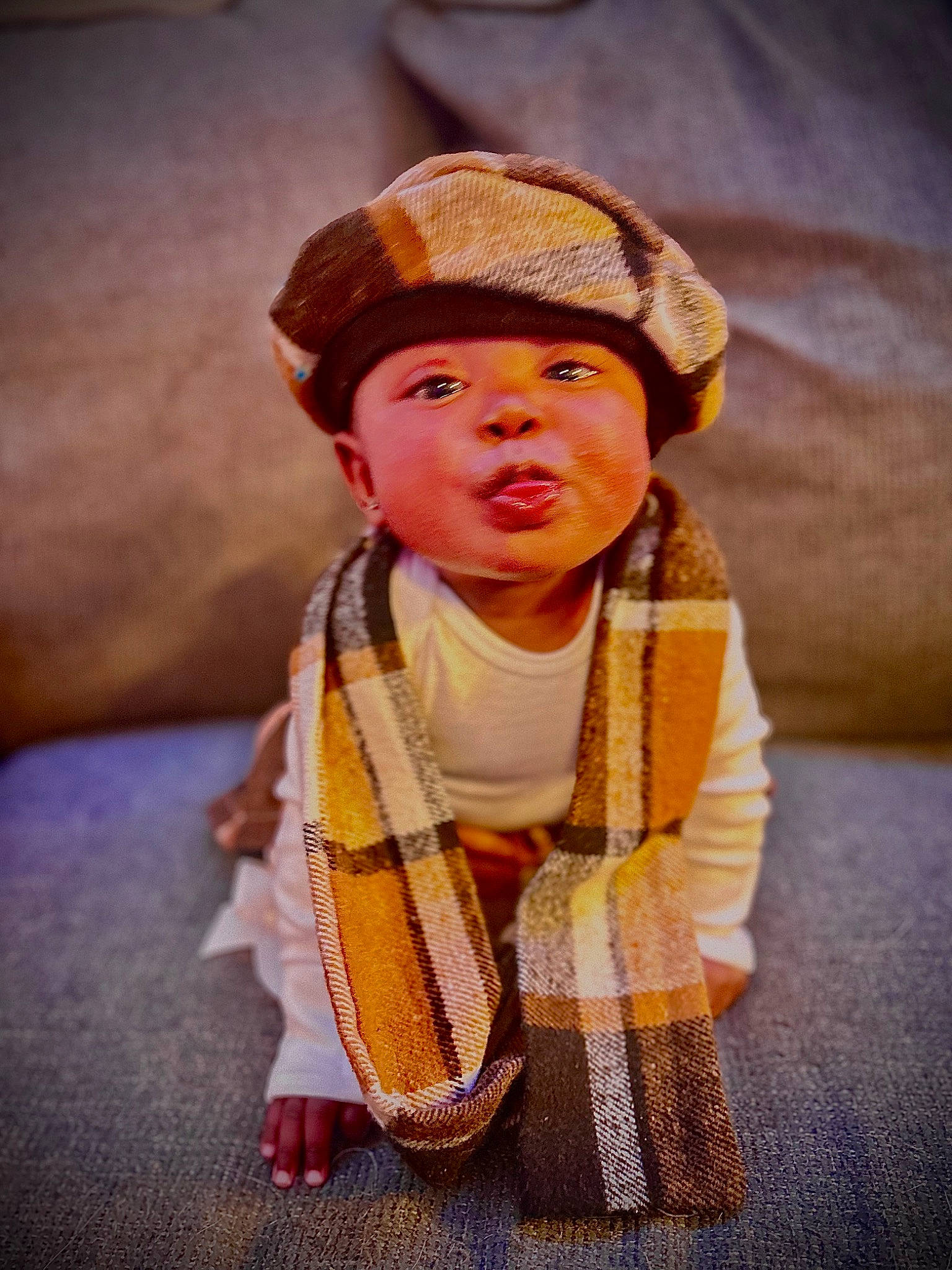 Dior joined the competition — help win amazing prizes! arm, baby, baby_toddler_clothing, cap, cheek, child, fashion_accessory, fashion_design, flash_photography, fun, hand, happy, headwear, human_body, pattern, peach, person, sitting, toddler, tradition