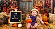 Noa joined the competition — help win amazing prizes! baby, infant, child, portrait, sitting, smiling, straw_hat, overalls, pumpkin, autumn, fall, leaves, flowers, sunflowers, rustic, farmhouse, wooden_background, harvest, chair, seasonal_photography