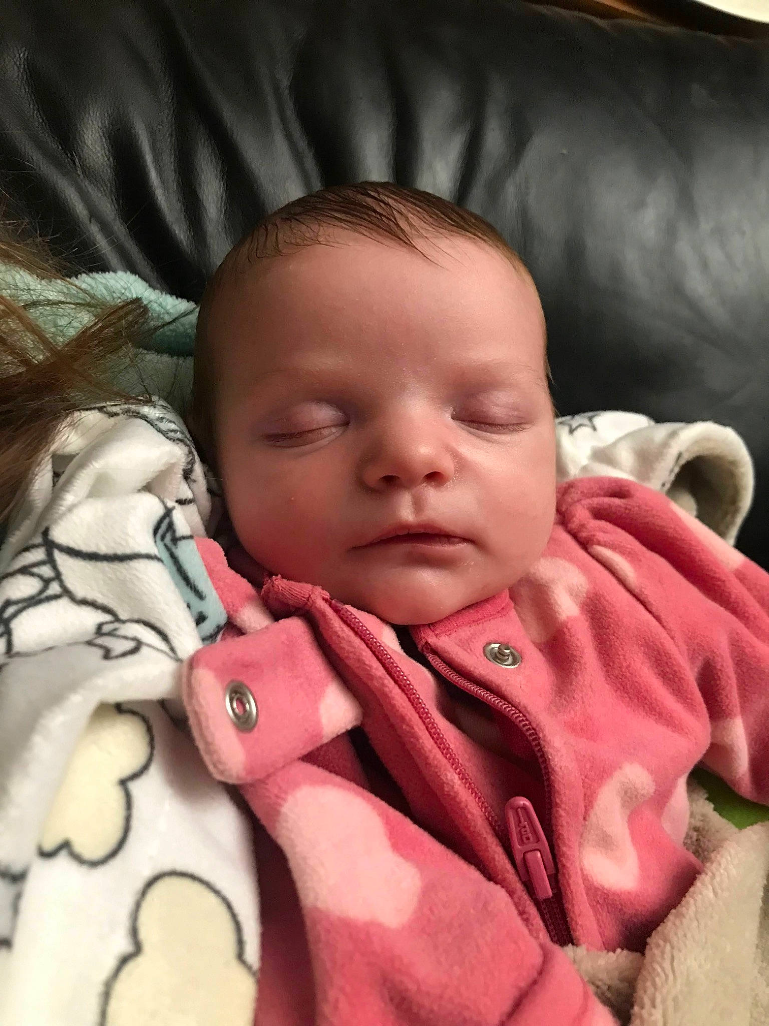 Gypsi is registered to the contest to win money with this photo: baby, baby_toddler_clothing, cheek, child, chin, close_up, comfort, eye, eyebrow, finger, happy, head, linens, lip, mouth, neck, nose, person, skin, sleeve