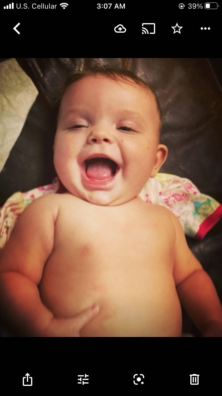 Gypsi is registered to the contest to win money with this photo: baby, cheek, chin, comfort, eyebrow, finger, flash_photography, gesture, happy, human_body, iris, jaw, lip, mouth, neck, nose, person, skin, smile, toddler