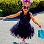 Adriel Theri Singbah is registered to the contest to win money with this photo: accessory, birthday, black_dress, celebration, child, fashion, girl, green_bush, happy_birthday, headband, outdoor, pavement, posing, purse, shadow, smiling, sunglasses, sunny, tutu, white_sneakers