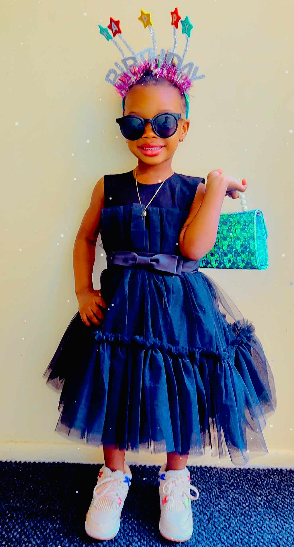 Adriel Theri Singbah joined the competition — help win amazing prizes! accessories, birthday, black_dress, celebration, child, confident, cute, dress, fashion, fun, handbag, happy, headband, indoor, portrait, smile, sneakers, standing, sunglasses, young_girl