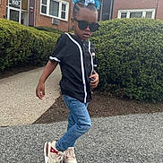 Adriel Theri Singbah is registered to the contest to win money with this photo: birthday_crown, black_jersey, building, bushes, casual, child, confident, cool, daytime, fashion, hair_bow, jeans, outdoor, person, pose, sidewalk, smile, sneakers, sunglasses, urban