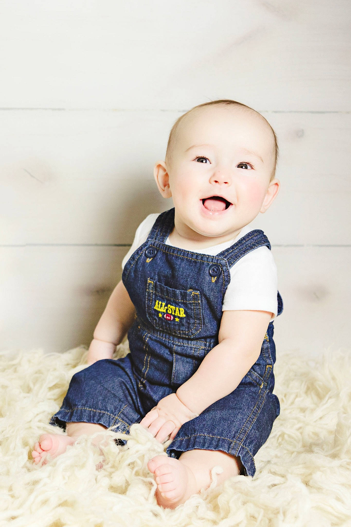 Stetson is registered to the contest to win money with this photo: baby, baby_toddler_clothing, cheek, child, child_model, eye, face, head, person, photo_shoot, photograph, photography, play, portrait, portrait_photography, sitting, skin, sleeve, smile, toddler