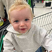 Alfie joined the competition — help win amazing prizes! toddler, child, shopping_cart, supermarket, hoodie, jeans, blonde_hair, blue_eyes, person, grocery, indoor, smiling, curious, clothing, retail, store_shelves, casual, shopping, young_child, portrait