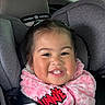 child, toddler, car_seat, smiling, pink_jacket, fleece, happy, face, hair, seatbelt, interior, vehicle, cute, portrait, baby, clothing, young_child, sitting, car, child_safety_seat