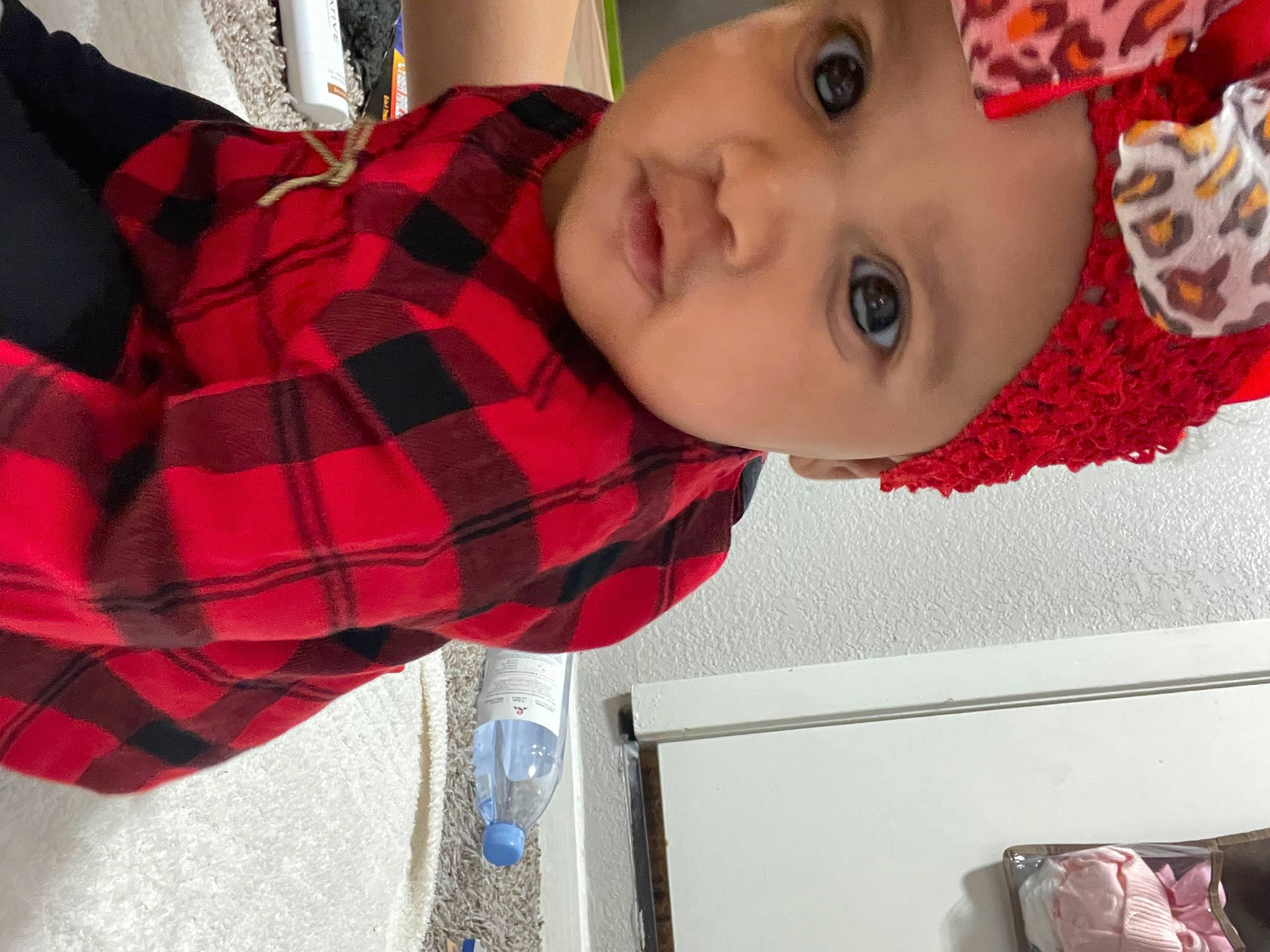 Dahlia is registered to the contest to win money with this photo: baby, child, collar, eyelash, fashion_accessory, fun, happy, headwear, lip, nose, pattern, person, plaid, plant, portrait_photography, red, sleeve, smile, tartan, toddler