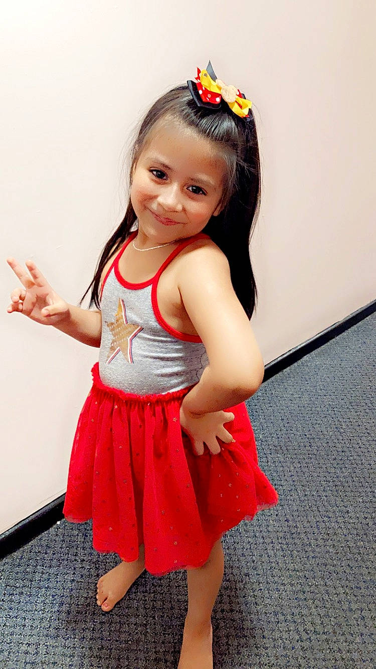 Brittany joined the competition — help win amazing prizes! eye, face, facial_expression, finger, gesture, hair, hairstyle, hand, happy, head, human_body, joy, leg, neck, person, pink, shoulder, skin, sleeve, smile