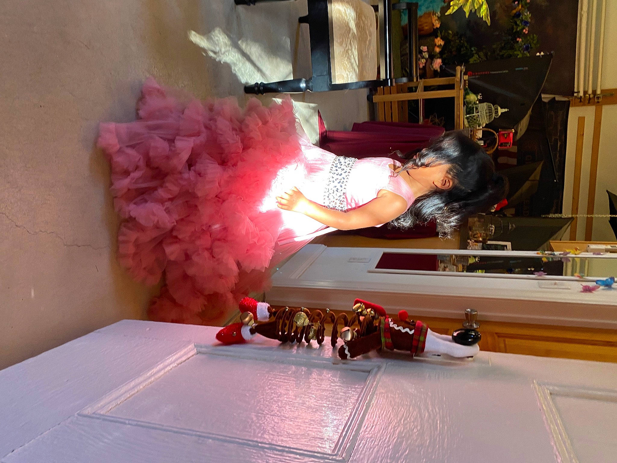 Katalina is registered to the contest to win money with this photo: curtain, dress, event, fashion_design, flooring, fun, hardwood, houseplant, machine, magenta, peach, person, petal, room, table, wood