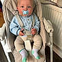Colby-Reece is registered to the contest to win money with this photo: baby, beige_pants, blue_sweater, child, clothing, comfort, curious, cute, face, furniture, hands, high_chair, indoor, infant, pacifier, portrait, radiator, seatbelt, socks, wooden_floor