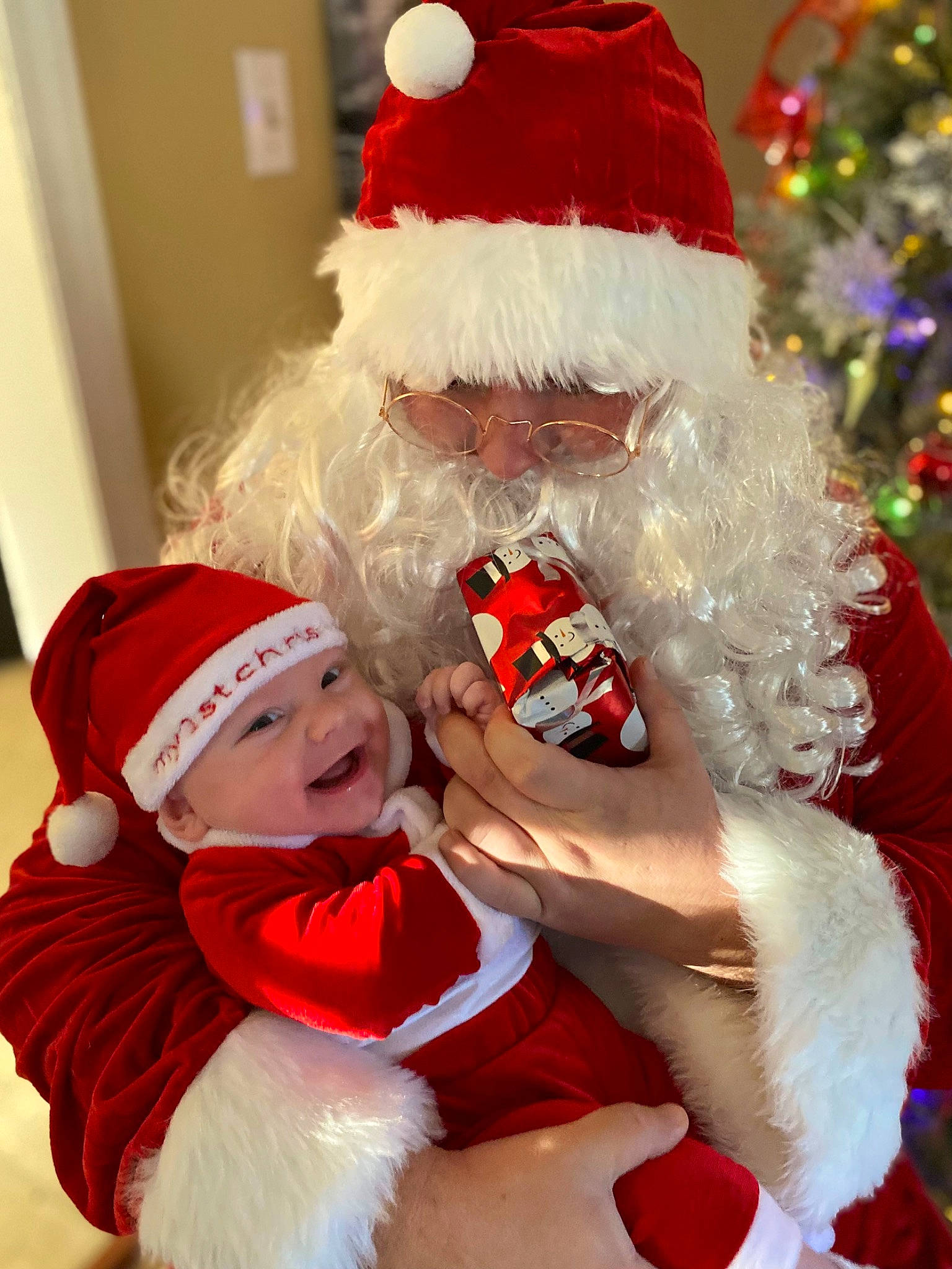 Dax joined the competition — help win amazing prizes! beard, christmas, christmas_decoration, christmas_tree, costume_hat, event, fictional_character, fun, fur, happy, hat, head, headgear, headwear, holiday, human_body, lap, person, red, santa_claus