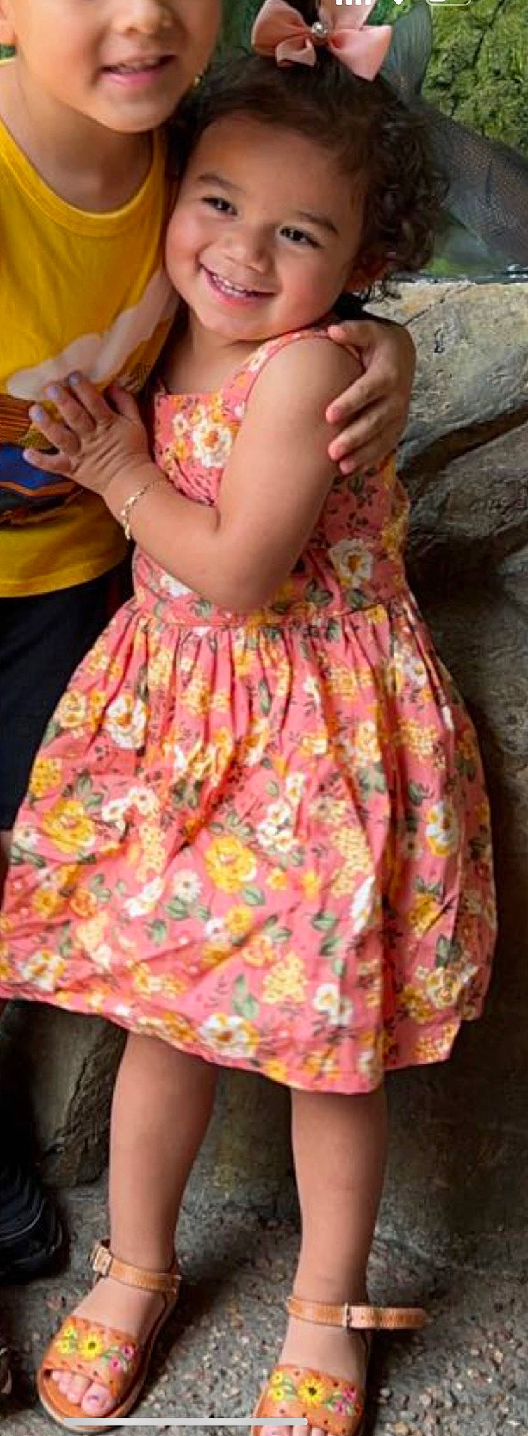 Yuliana is registered to the contest to win money with this photo: arm, beauty, day_dress, dress, facial_expression, fashion_design, formal_wear, hand, headwear, human_body, joint, joy, leg, magenta, one_piece_garment, orange, person, pink, plant, shoulder