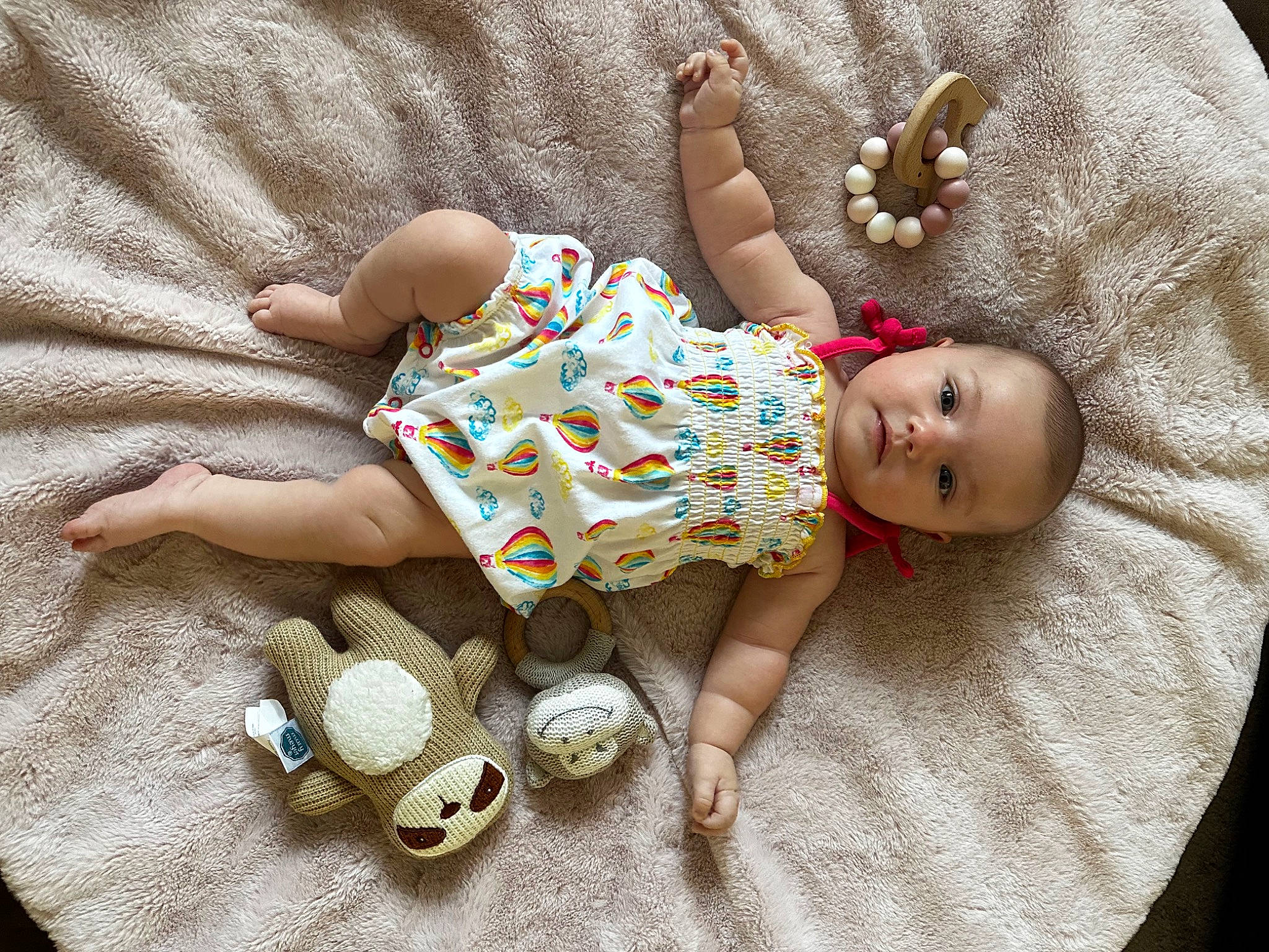 Delilah joined the competition — help win amazing prizes! baby, baby_sleeping, baby_toddler_clothing, child, comfort, doll, fawn, finger, hand, headgear, human_body, linens, pattern, person, product, skin, sleeve, textile, toddler, toy