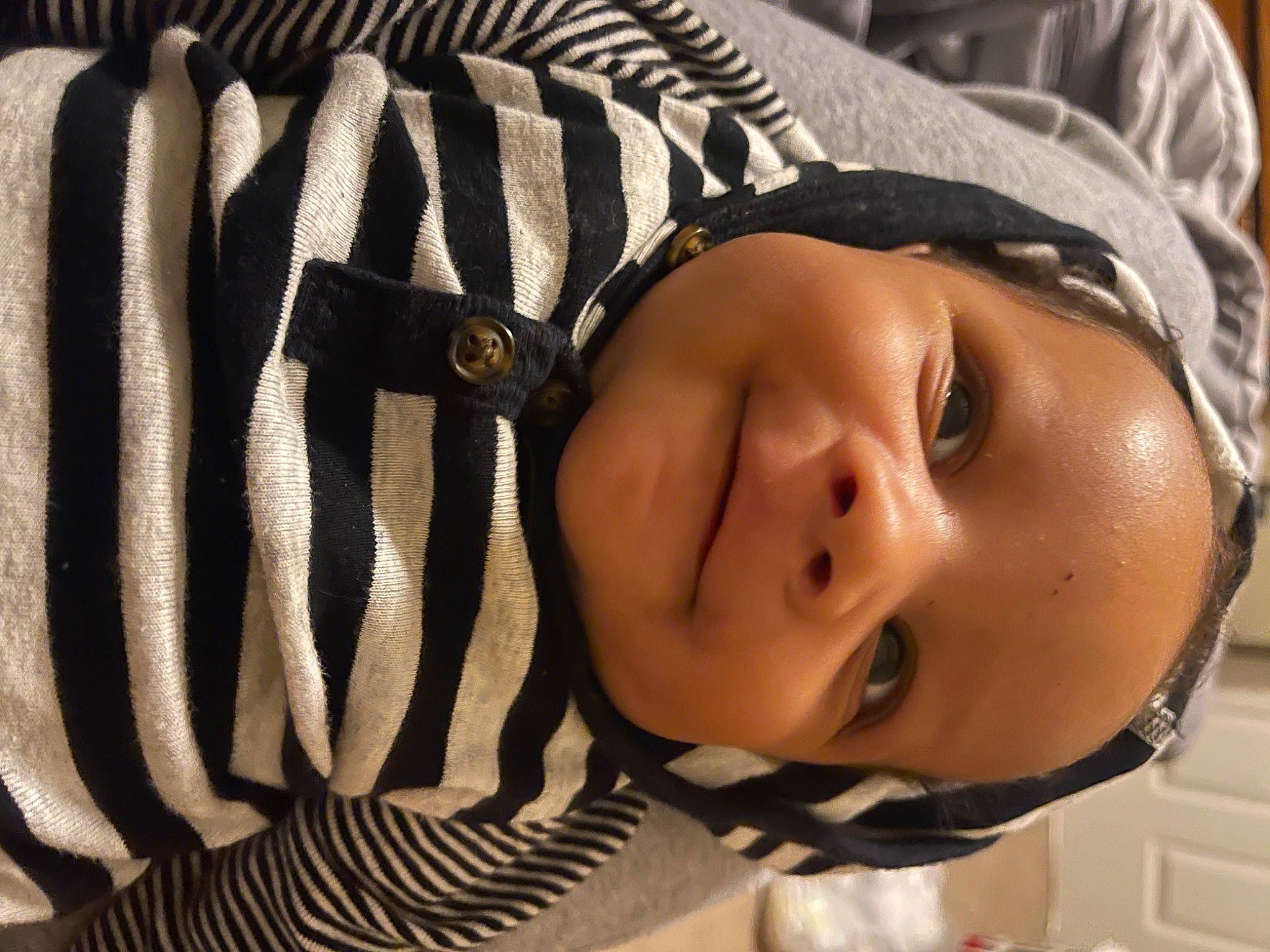 Sereno is registered to the contest to win money with this photo: baby, baby_toddler_clothing, black_hair, cheek, child, cool, eye, eyebrow, eyelash, eyewear, facial_expression, flash_photography, hairstyle, happy, headgear, iris, joy, lip, person, skin