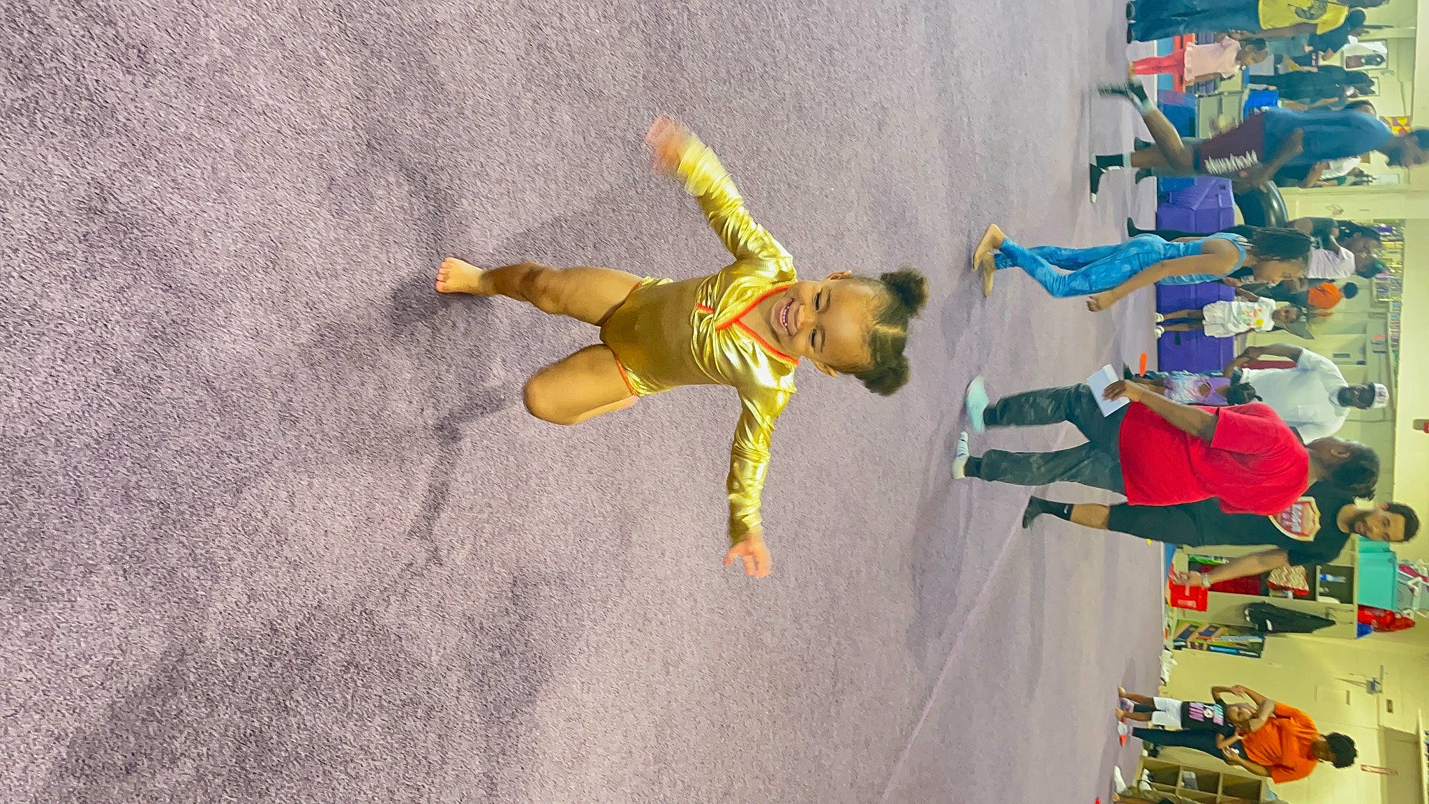 Say is registered to the contest to win money with this photo: adventure, child, competition, competition_event, extreme_sport, fun, joy, knee, leisure, person, play, recreation, room, shadow, shorts, smile, sport_climbing, sports, sportswear, thigh