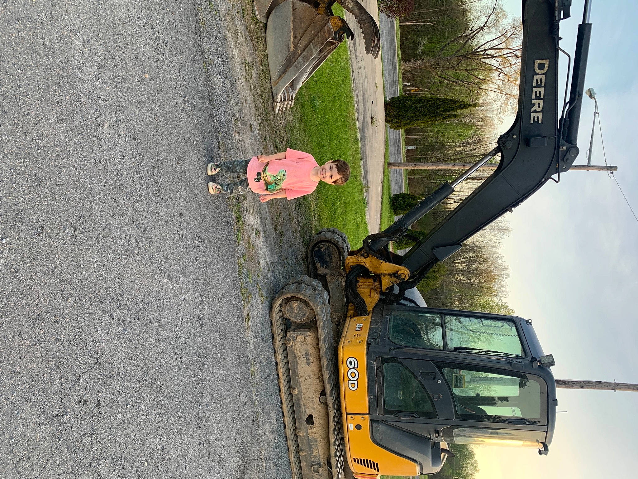 Malakai is registered to the contest to win money with this photo: asphalt, auto_part, automotive_exterior, automotive_lighting, automotive_tire, automotive_wheel_system, bicycle_tire, car, joy, motor_vehicle, person, plant, public_utility, rim, road_surface, rolling, sky, tire, tree, vehicle