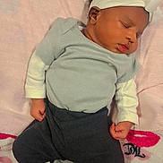 Makayla joined the competition — help win amazing prizes! baby, sleeping, headband, blanket, cozy_clothing, infant, cute, soft_toys, peaceful, indoors, newborn, feet, hands, pink, white, gray, portrait, resting, adorable, child