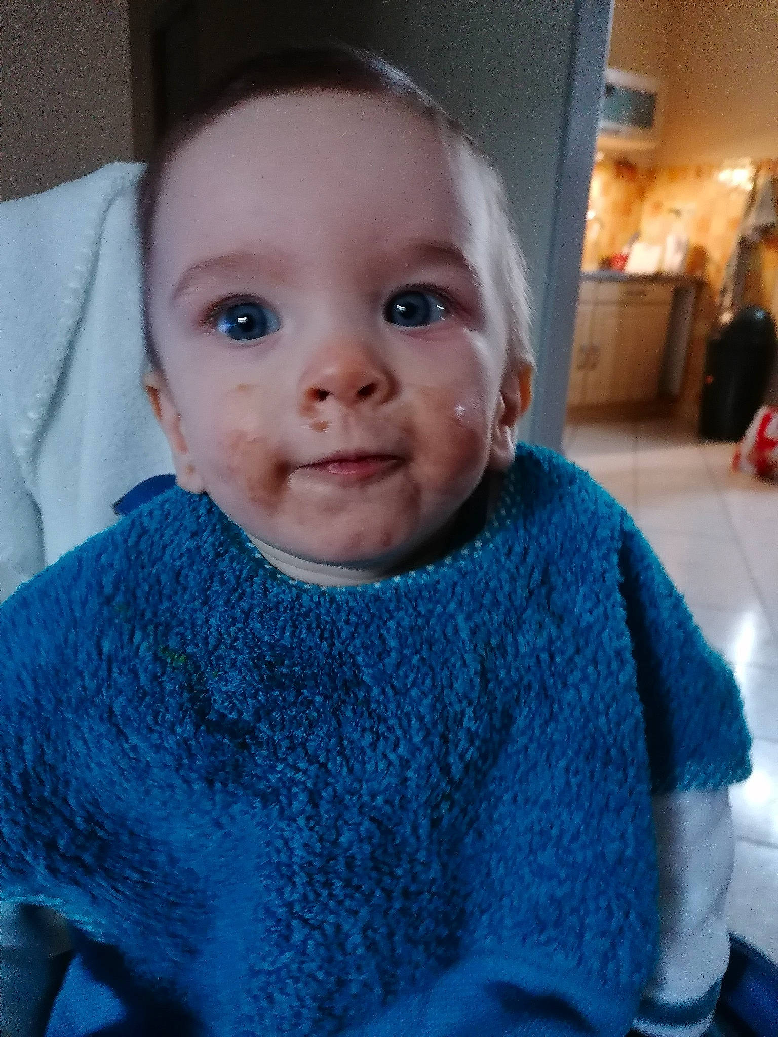 Mathéo participe au concours pour gagner de l'argent avec cette photo : art, azure, baby, baby_toddler_clothing, cheek, child, electric_blue, grey, iris, neck, pattern, person, sitting, skin, sleeve, smile, textile, toddler, wool, woolen