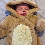 Lilly-Joan joined the competition — help win amazing prizes! antlers, baby, bed, blanket, child, closed_eyes, costume, cozy, cute, face, fur, hood, indoors, infant, lying_down, reindeer, sleeping, smiling, soft, warm