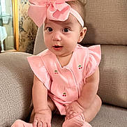 Alani is registered to the contest to win money with this photo: baby, child, infant, sitting, couch, portrait, pink, bow, headband, dress, socks, cherries, smiling, indoors, home, furniture, face, eyes, daylight, cute