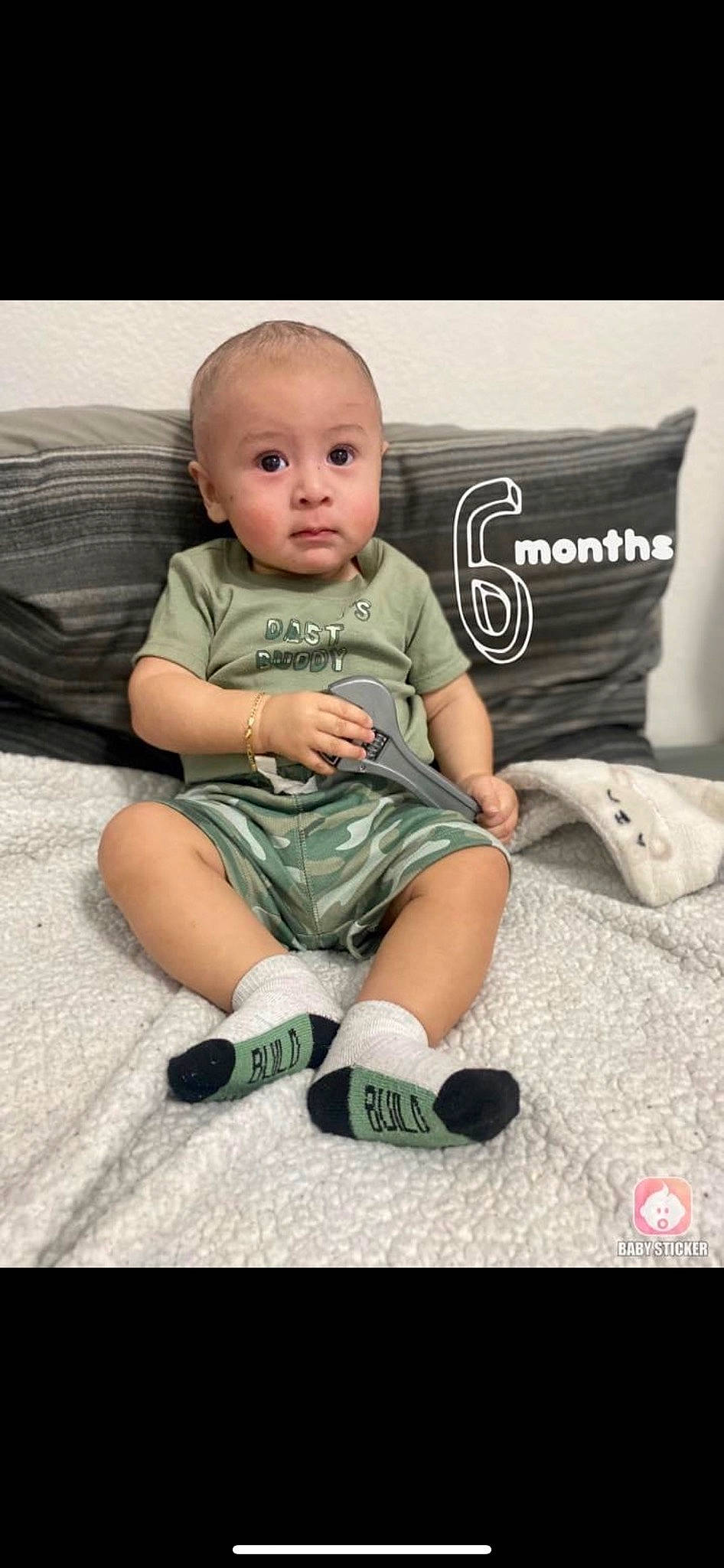 Nathaniel is registered to the contest to win money with this photo: baby, baby_toddler_clothing, child, comfort, cool, fashion_accessory, flooring, foot, happy, human_leg, knee, pattern, person, shorts, sitting, sleeve, sock, sportswear, surprise, t_shirt