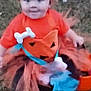 toddler, child, costume, halloween, pumpkin, tutu, grass, outdoor, cute, baby, headband, orange, dress, fall, holiday, face, person, young, sitting, festive