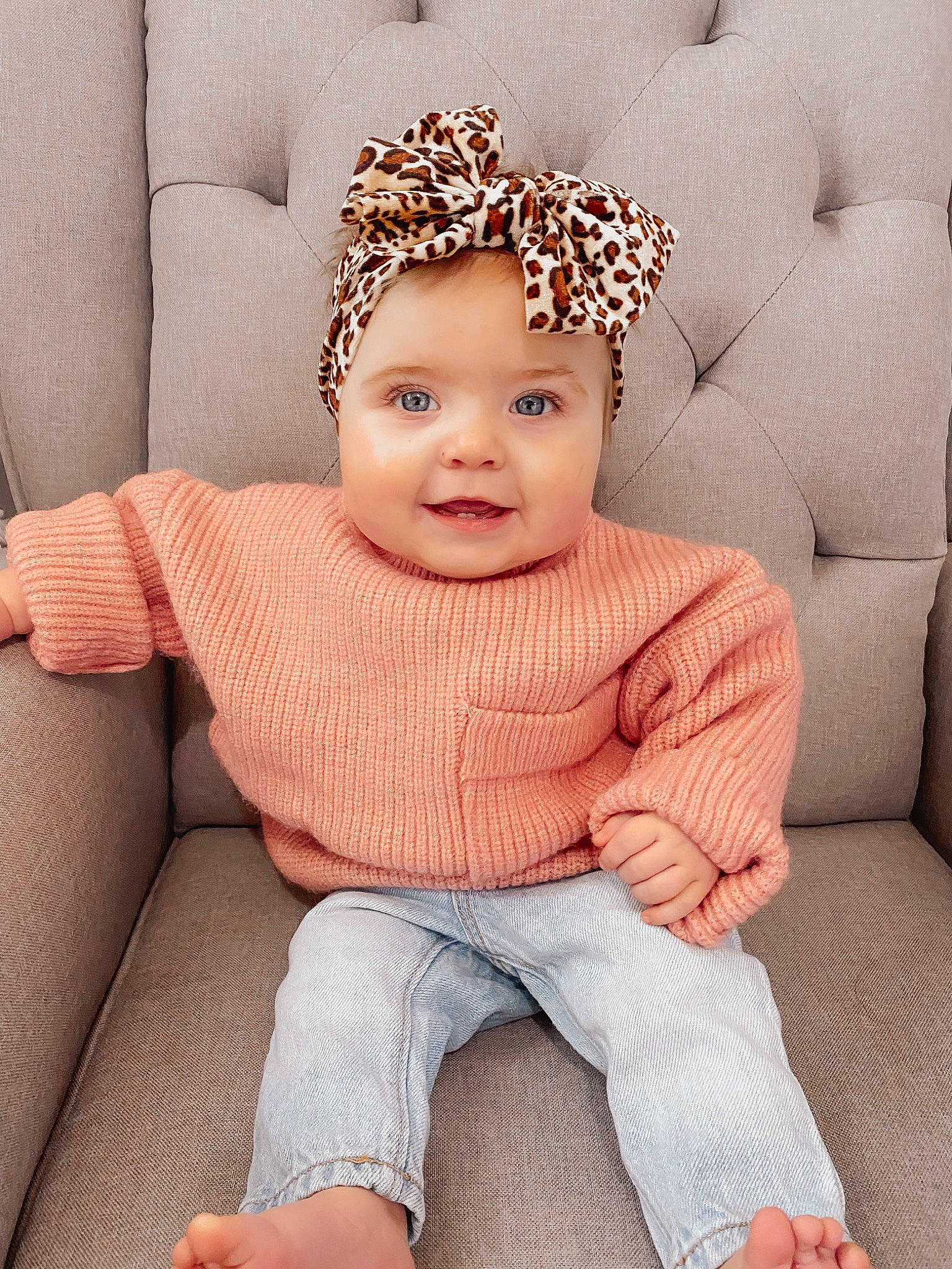 Willow Grace is registered to the contest to win money with this photo: arm, baby_toddler_clothing, cap, clothing, comfort, cool, eye, eyelash, face, flash_photography, happy, headgear, headwear, lip, neck, person, skin, sleeve, smile, thigh