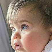 Connor joined the competition — help win amazing prizes! baby, child, face, portrait, close_up, blue_eyes, curly_hair, soft_light, infant, cute, expression, skin, cheeks, clothing, newborn, indoors, person, young, looking, side_view