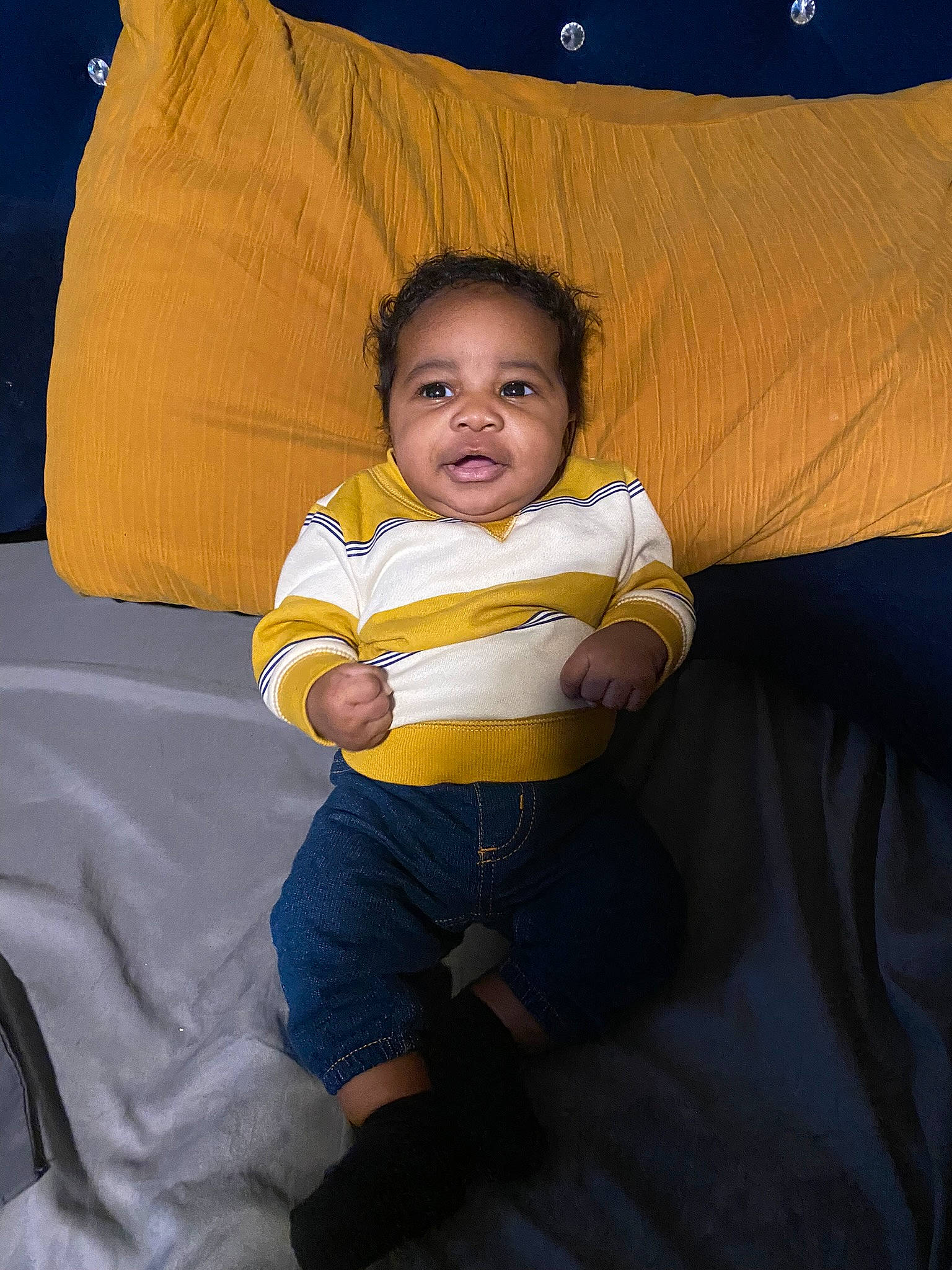 Kamani joined the competition — help win amazing prizes! baby, baby_toddler_clothing, barefoot, cheek, child, comfort, couch, finger, fun, hairstyle, happy, human_body, human_leg, knee, lap, linens, person, sitting, thigh, toddler