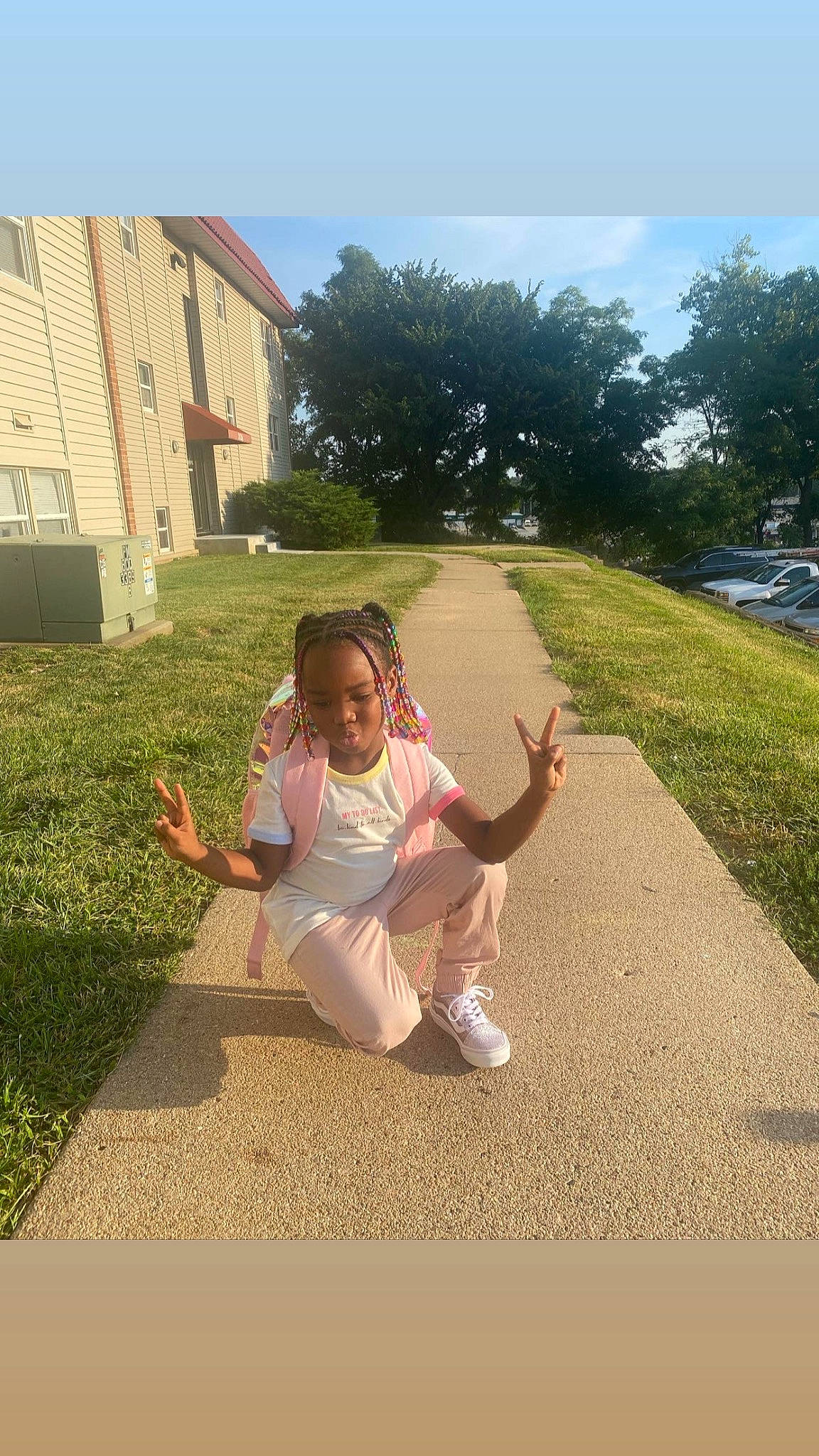 Kamani is registered to the contest to win money with this photo: asphalt, dress, foot, fun, gesture, grass, grassland, happy, human_leg, landscape, lawn, leisure, people_in_nature, person, plant, recreation, road_surface, sky, soil, toddler