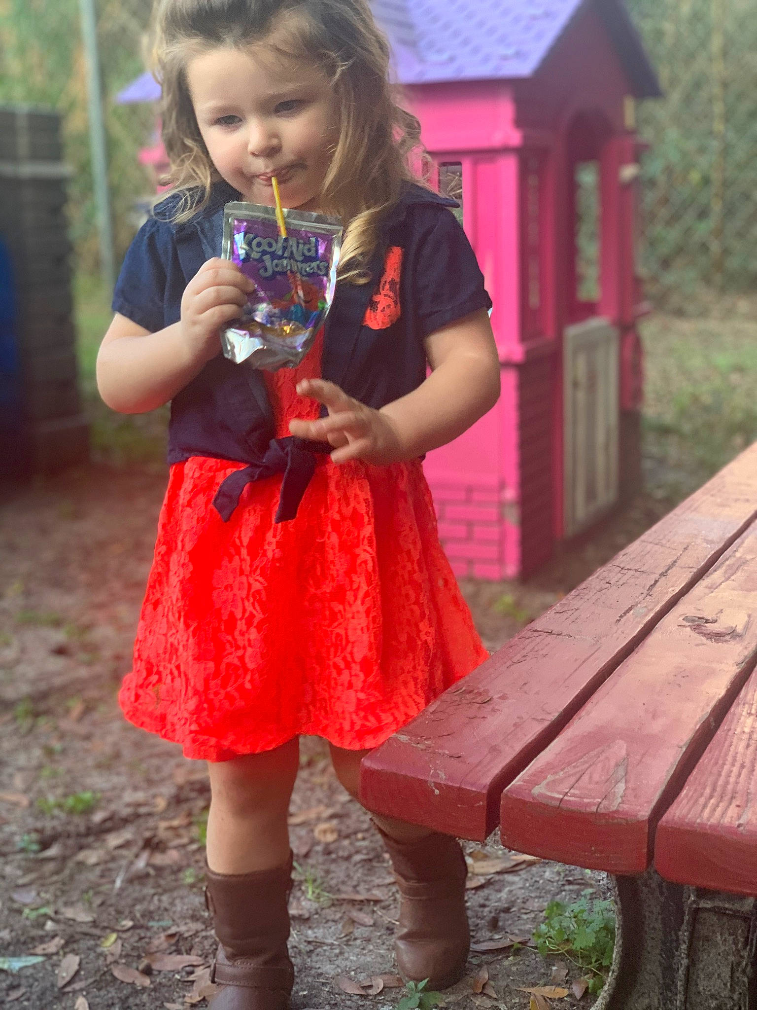 Addilynn is registered to the contest to win money with this photo: baby_toddler_clothing, beauty, clothing, day_dress, fun, grass, happy, magenta, outdoor_bench, outdoor_furniture, person, photograph, pink, purple, red, shoe, skin, sleeve, standing, toddler